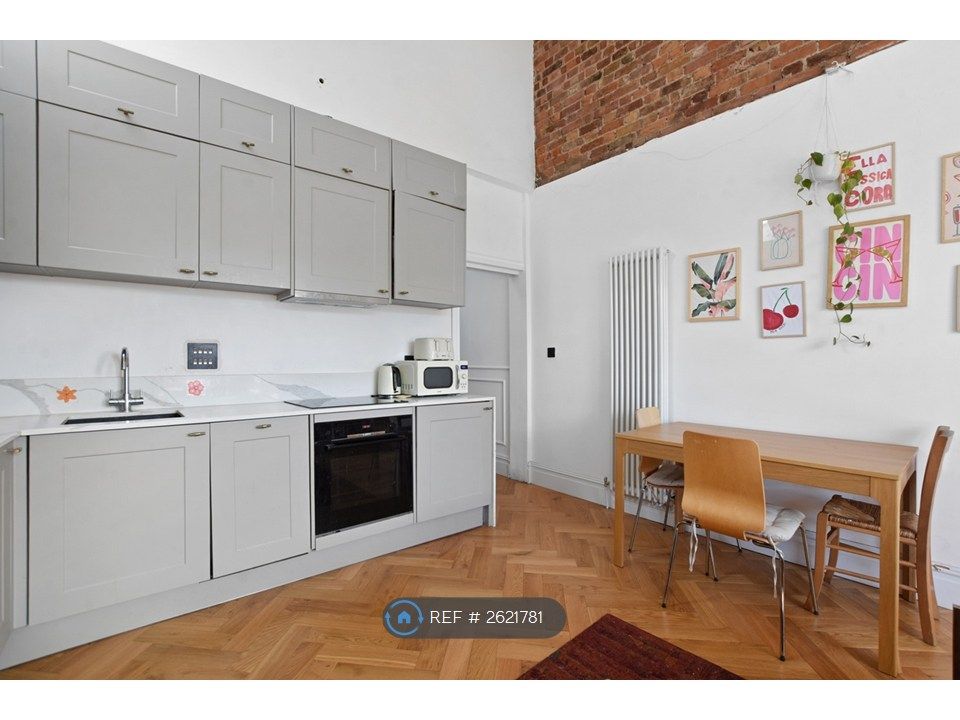 Property photo 3 of 10 Kitchen/Living Room