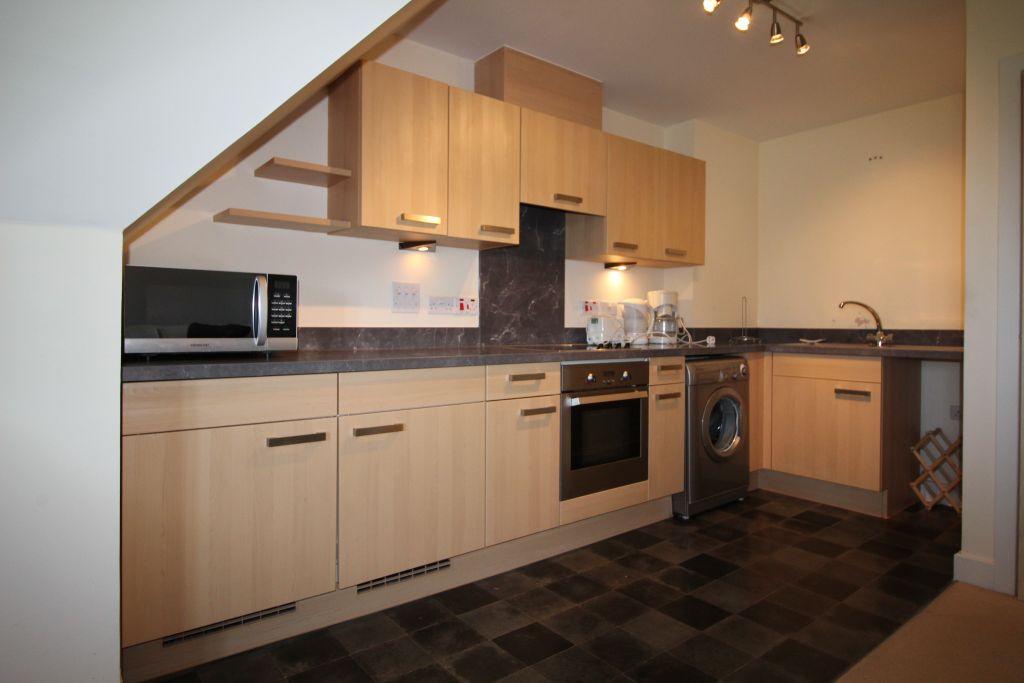 Property photo 3 of 8 Kitchen (Open Plan To Lounge)