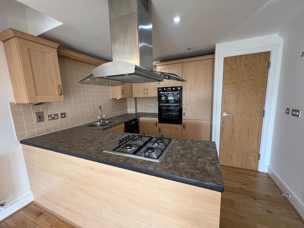 Property photo 2 of 12 Kitchen