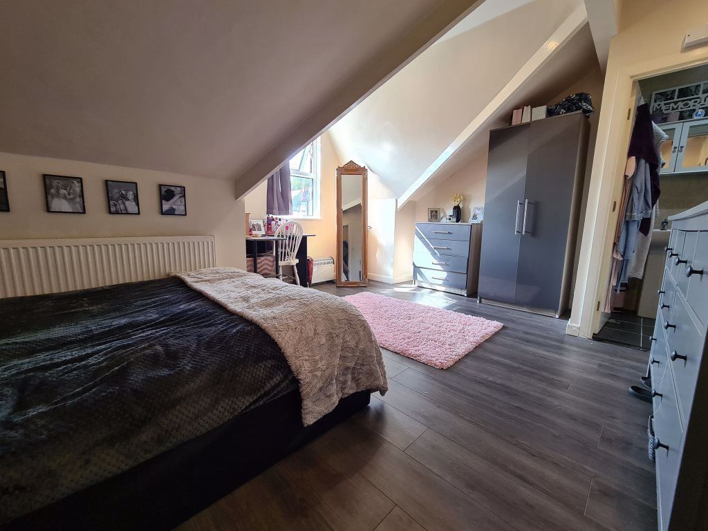 Property photo 2 of 9 Spacious Master Bedroom Featuring A Comfortable Do...