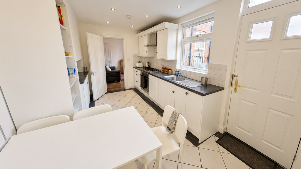 Property photo 2 of 16 Bright Modern Galley Kitchen Dining Area