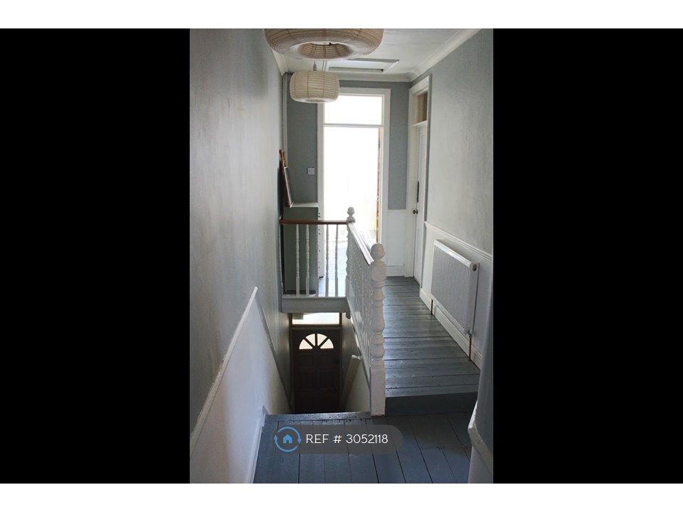Property photo 3 of 7 Hallway Facing Living Room