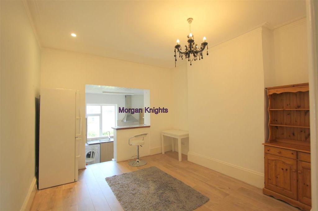 Property photo 2 of 11 Living Room: