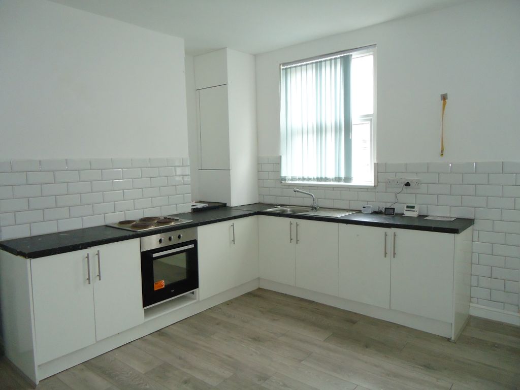 Property photo 3 of 8 Kitchen