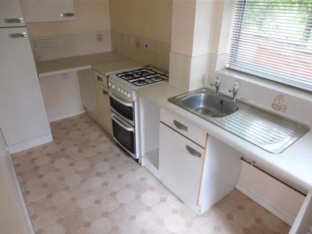 Property photo 3 of 7 Kitchen