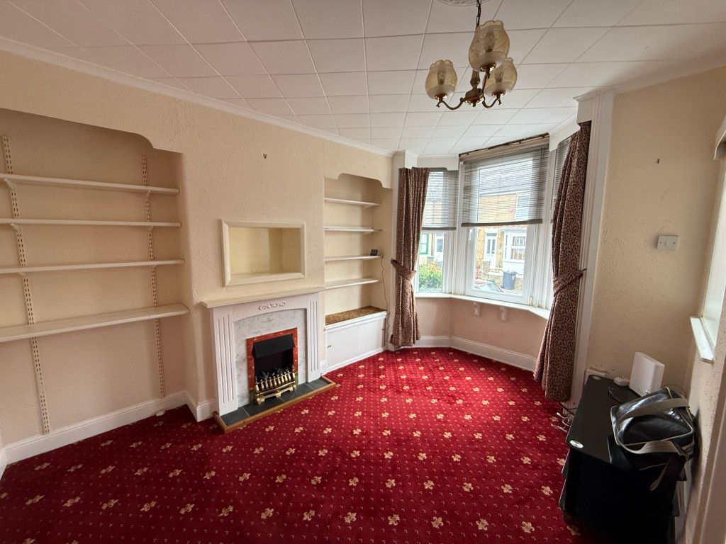 Property photo 3 of 9 Living Room With Carpet And Fireplace