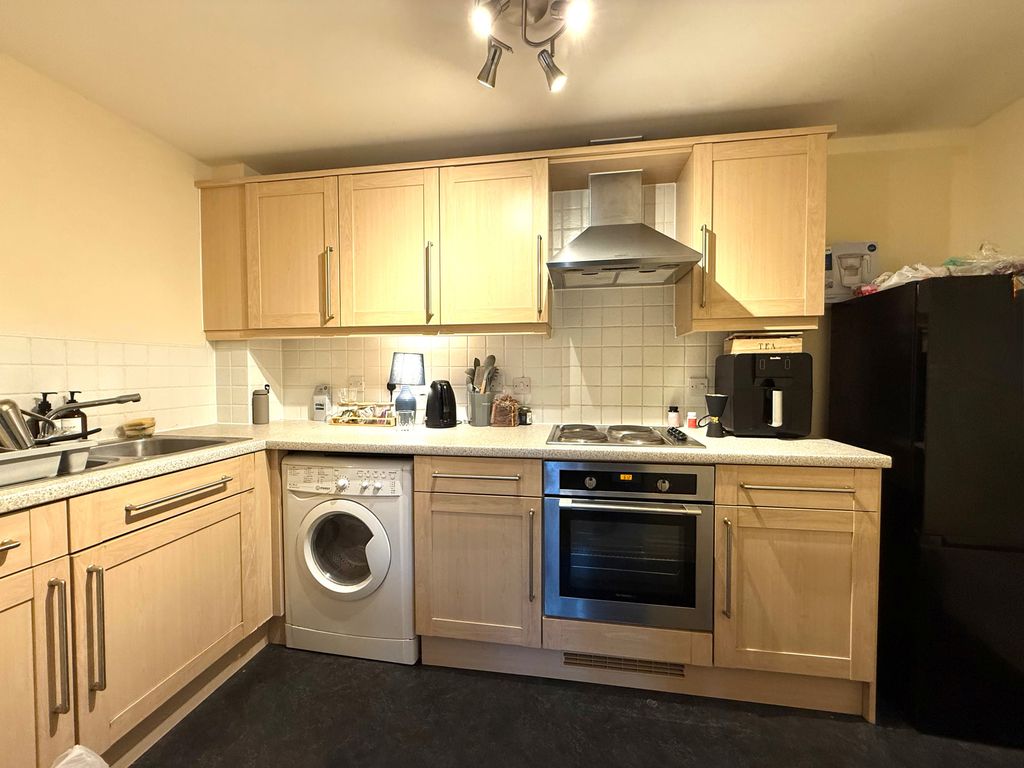 Property photo 3 of 8 Kitchen