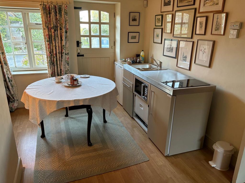 Property photo 2 of 10 Dining And Mini Kitchen Area