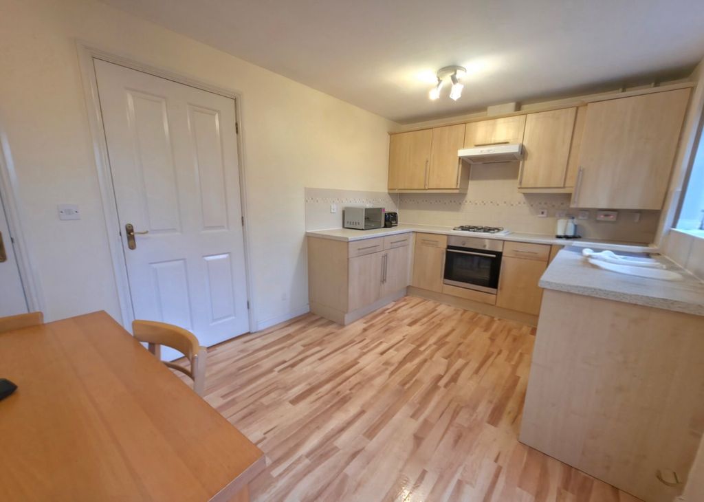 Property photo 3 of 15 Dining Kitchen