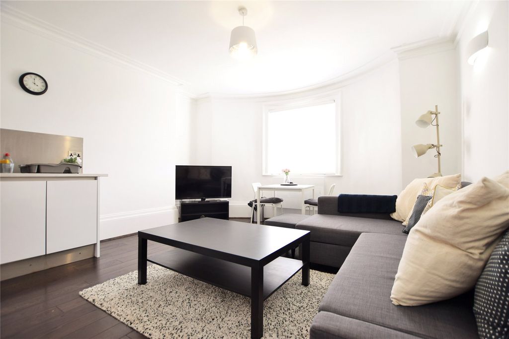 Property photo 2 of 8 Living Area