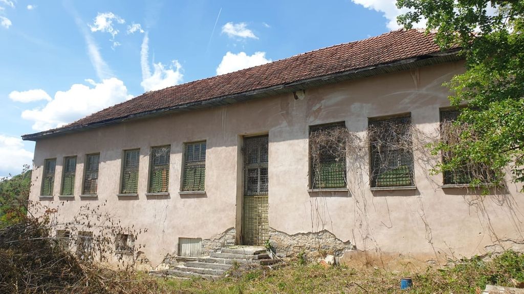 Property photo 3 of 26 Facade Of The Old School Showing Barred Windows, Tiled Roof, And Gated Entrance With Steps