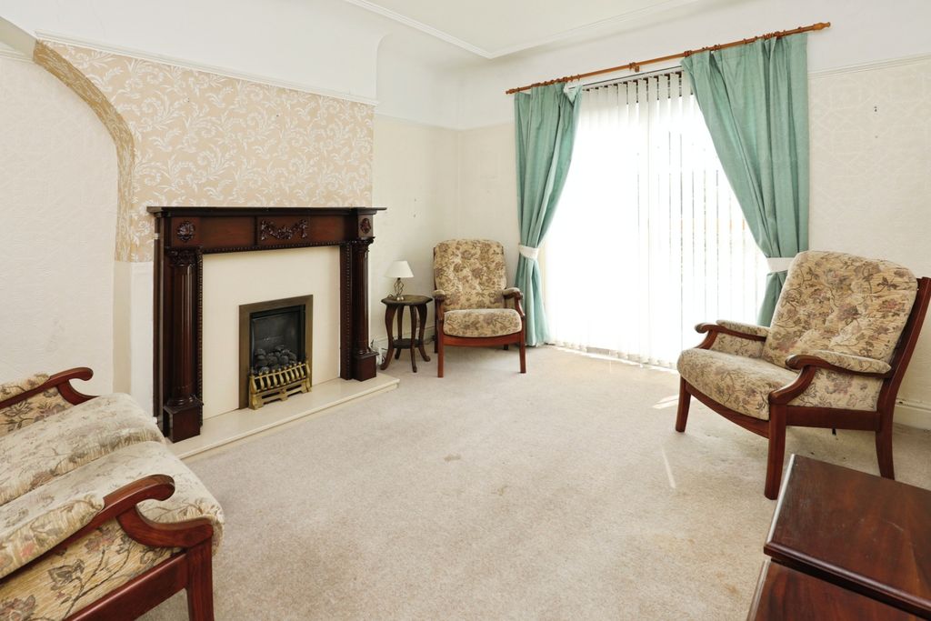 Property photo 3 of 8 Sitting Room