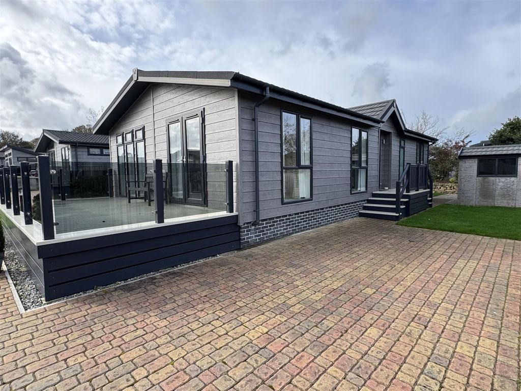 Property photo 2 of 17 Front And Driveway