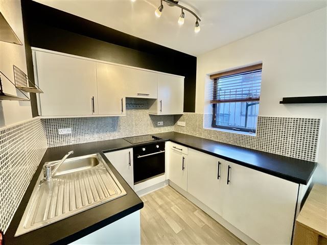 Property photo 3 of 12 Kitchen