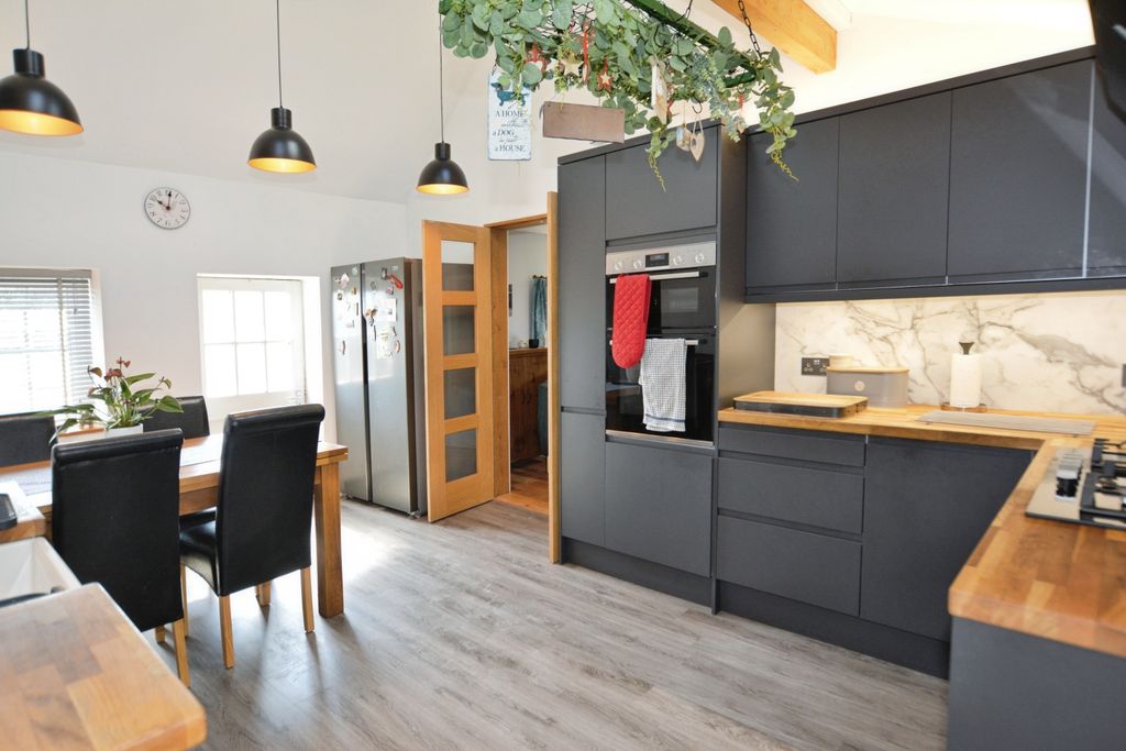 Property photo 2 of 17 Kitchen-Dining