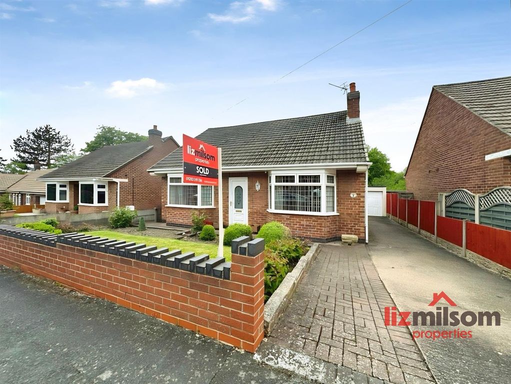 Property photo 1 of 24 Front Sold Blue Sky.Jpg