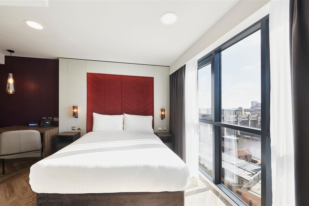 Property photo 2 of 6 Bright Bedroom With Large Windows And City Views...