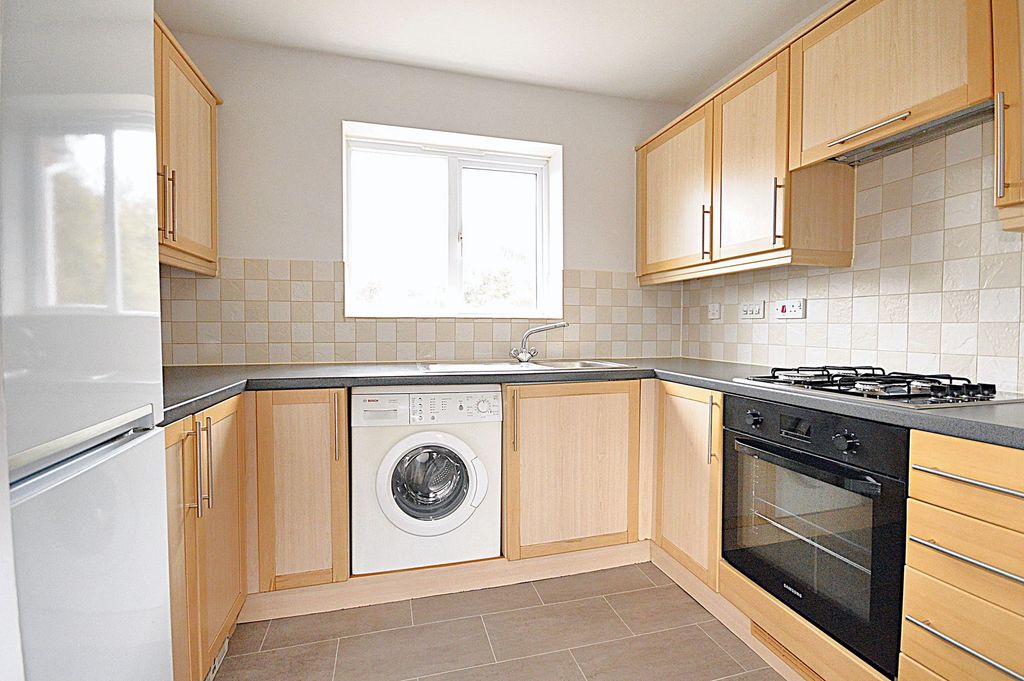 Property photo 3 of 7 Kitchen