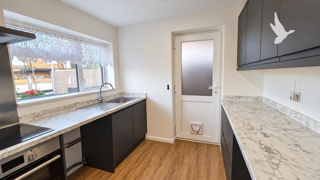 Property photo 3 of 19 Kitchen One