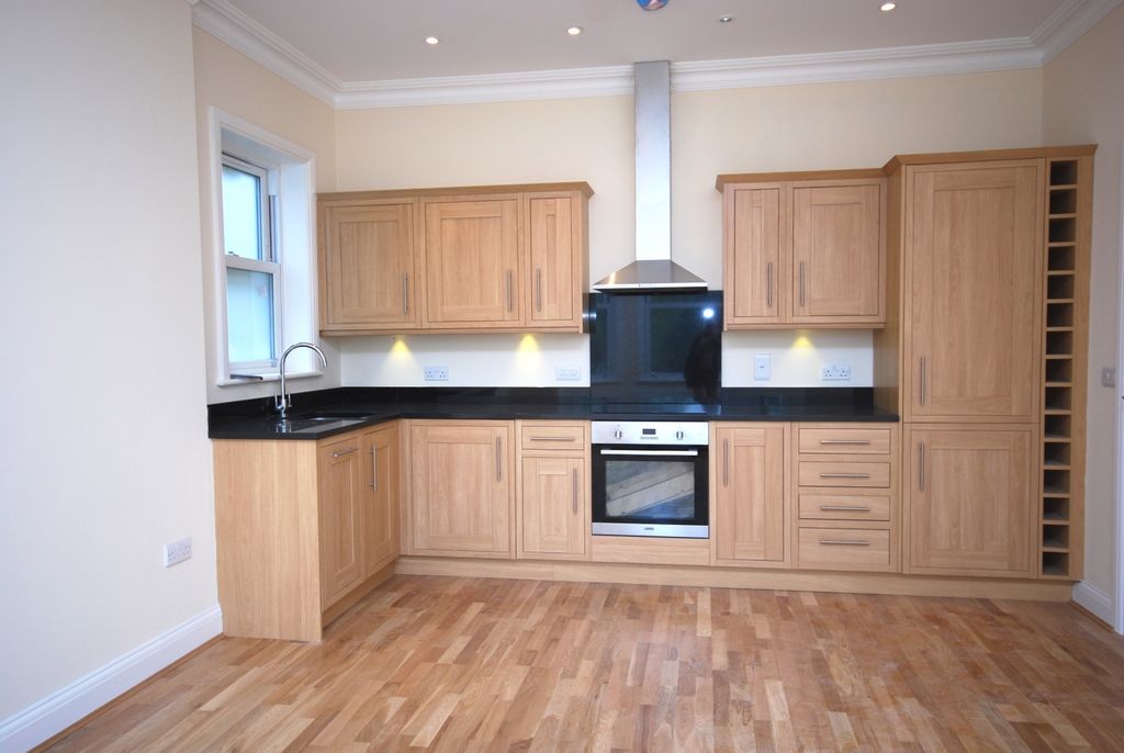 Property photo 3 of 8 Kitchen Area