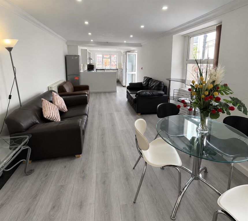 Property photo 1 of 8 Contemporary Living Space With Grey Oak Flooring.P