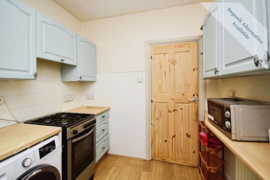 Property photo 3 of 13 Kitchen