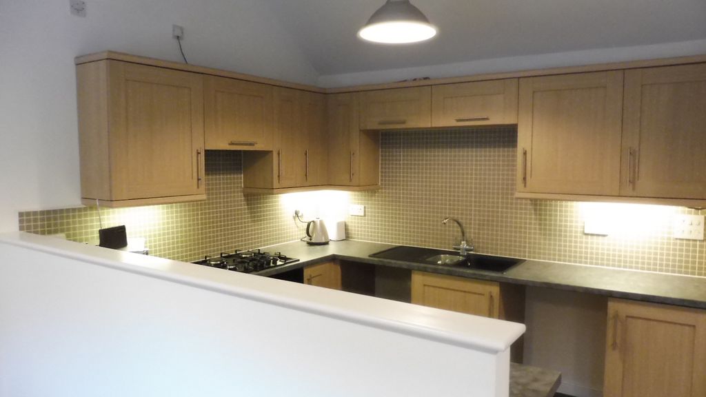 Property photo 3 of 7 Kitchen