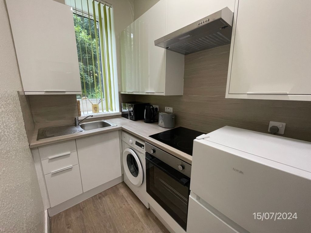 Property photo 2 of 8 Kitchen