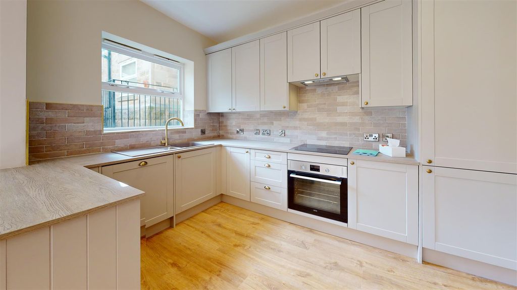 Property photo 2 of 9 19-Regency-Court-Kitchen.Jpg