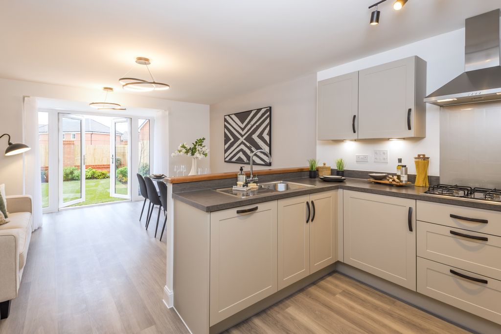 Property photo 2 of 9 Kitchen And Dining Room In The 3 Bedroom Greenwood