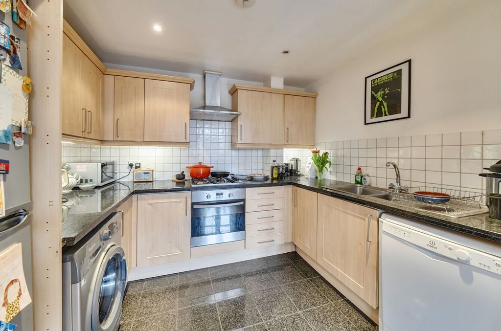 Property photo 3 of 12 Kitchen