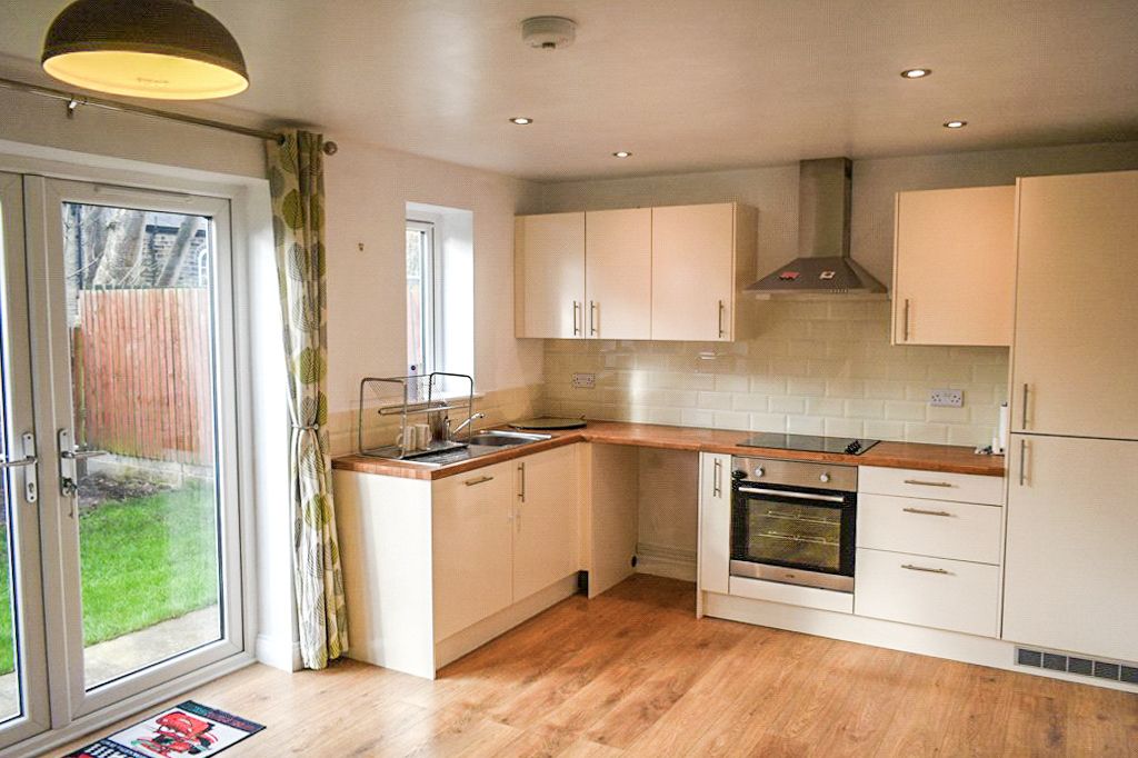 Property photo 3 of 16 Dining Kitchen