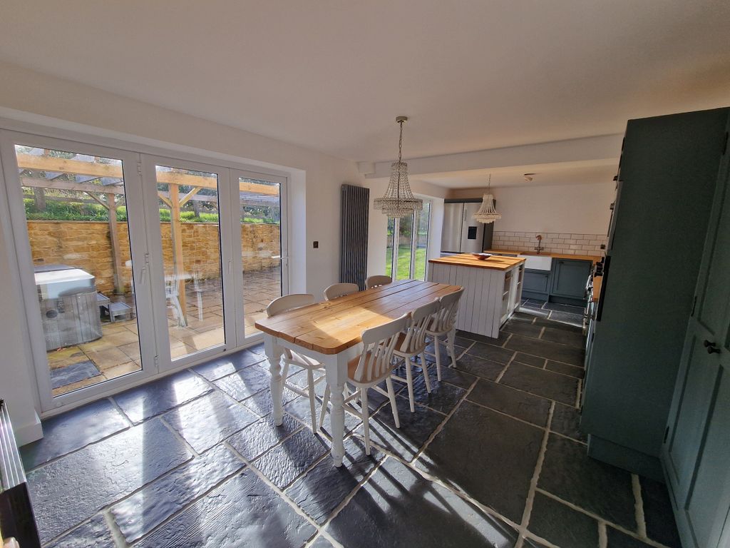 Property photo 3 of 25 Kitchen-Dining Room