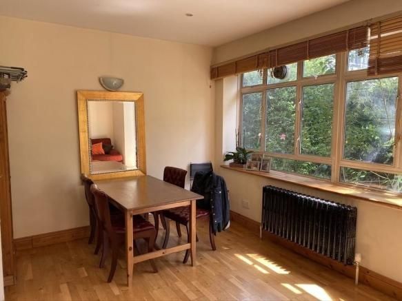 Property photo 1 of 12 Bright Living Area With Large Windows And Mirror...