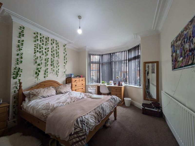 Property photo 1 of 13 A Bright And Inviting Master Bedroom With A Spacio...