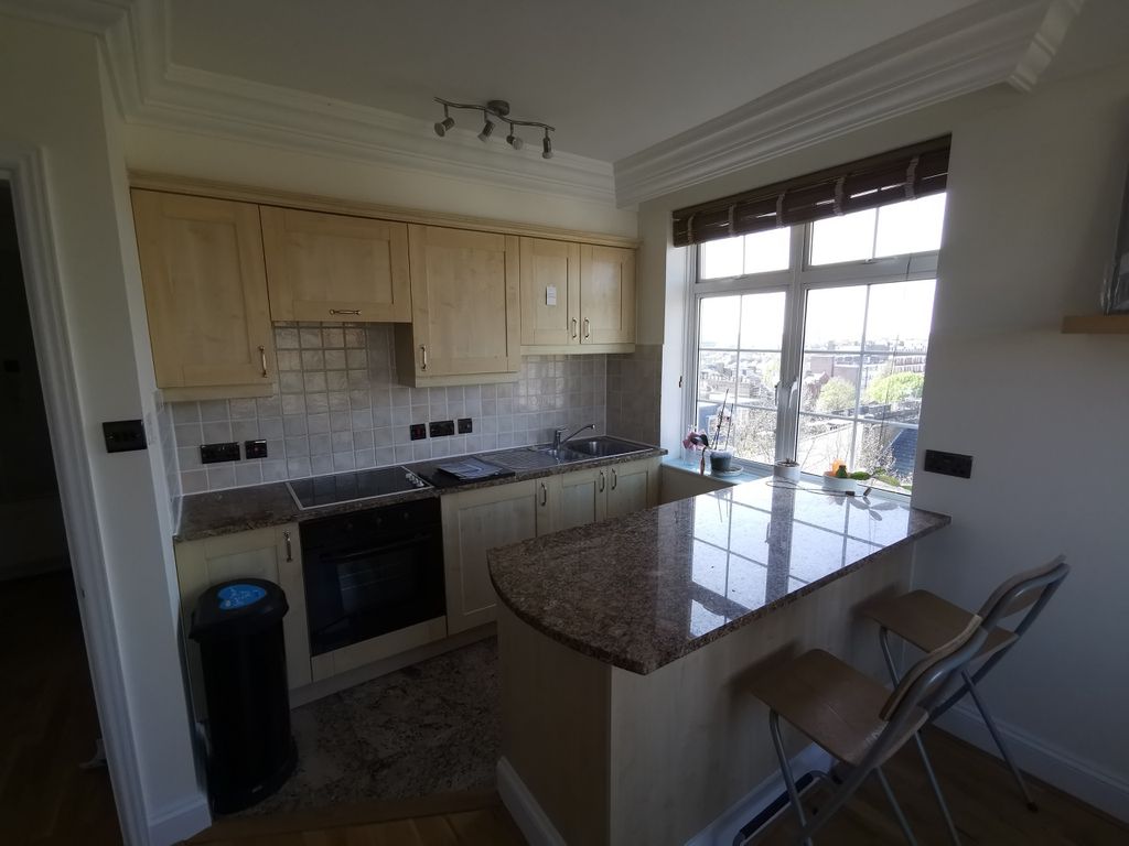 Property photo 2 of 8 Kitchen