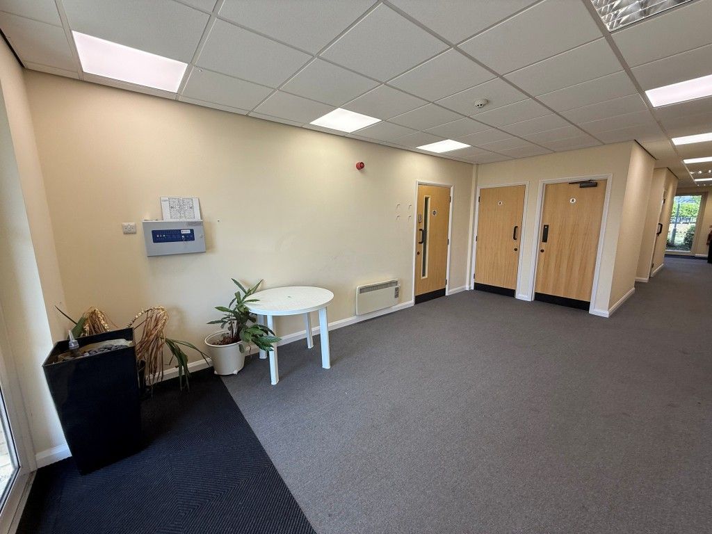 Property photo 2 of 15 Carpeted Lobby With Doors To Office And Wc's