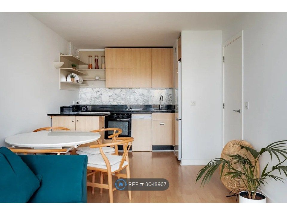 Property photo 2 of 13 Livingroom + Kitchen