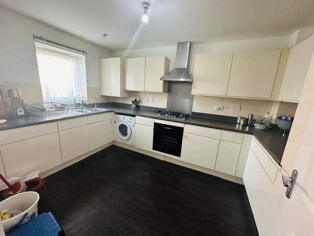 Property photo 3 of 13 Kitchen