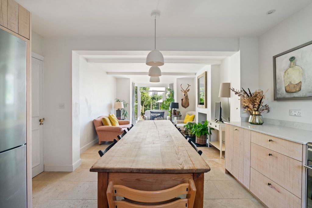 Property photo 1 of 15 Kitchen/Dining/Living Area