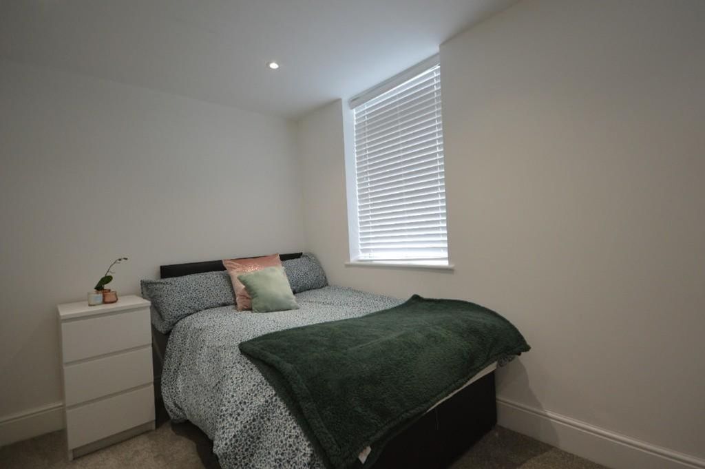Property photo 3 of 15 Cozy And Inviting Double Bedroom Featuring A Comfo...