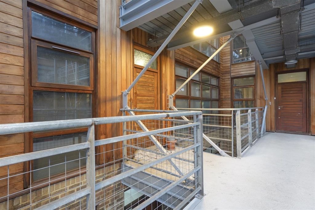 Property photo 2 of 14 Exterior Of Building & Street