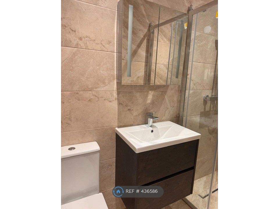 Property photo 3 of 8 Modern Bathroom