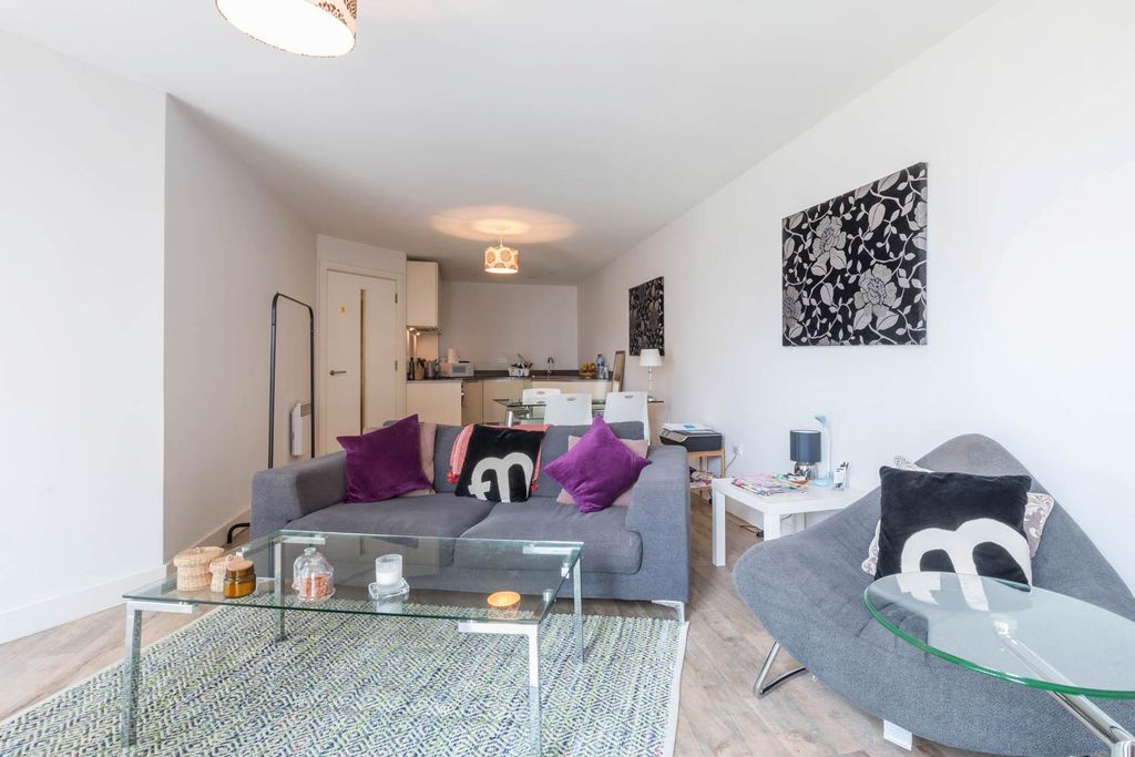 Property photo 1 of 9 Living Area