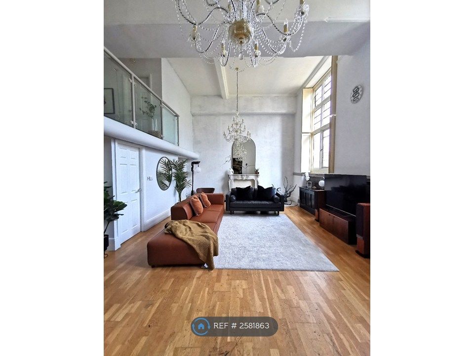 Property photo 1 of 11 Double-Height Living Room