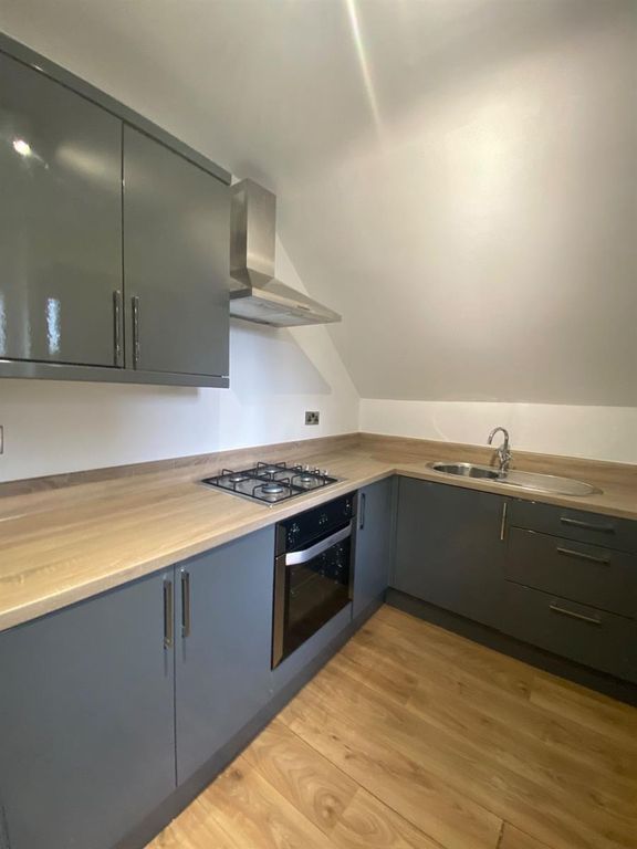 Property photo 1 of 6 Contemporary L-Shaped Kitchen With Grey Fitted Cab...