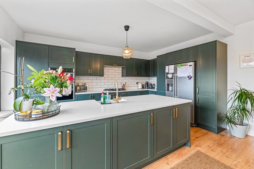 Property photo 3 of 21 Kitchen/Dining/Family Room