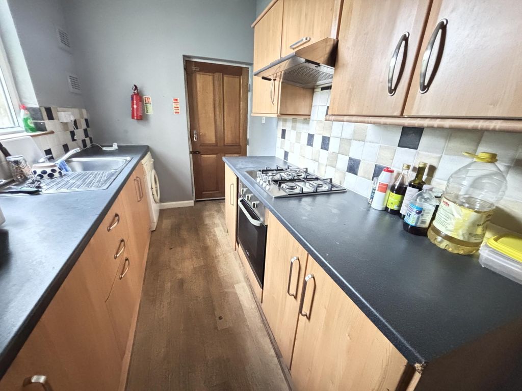 Property photo 2 of 5 A Well-Maintained Kitchen With Ample Countertop Sp...