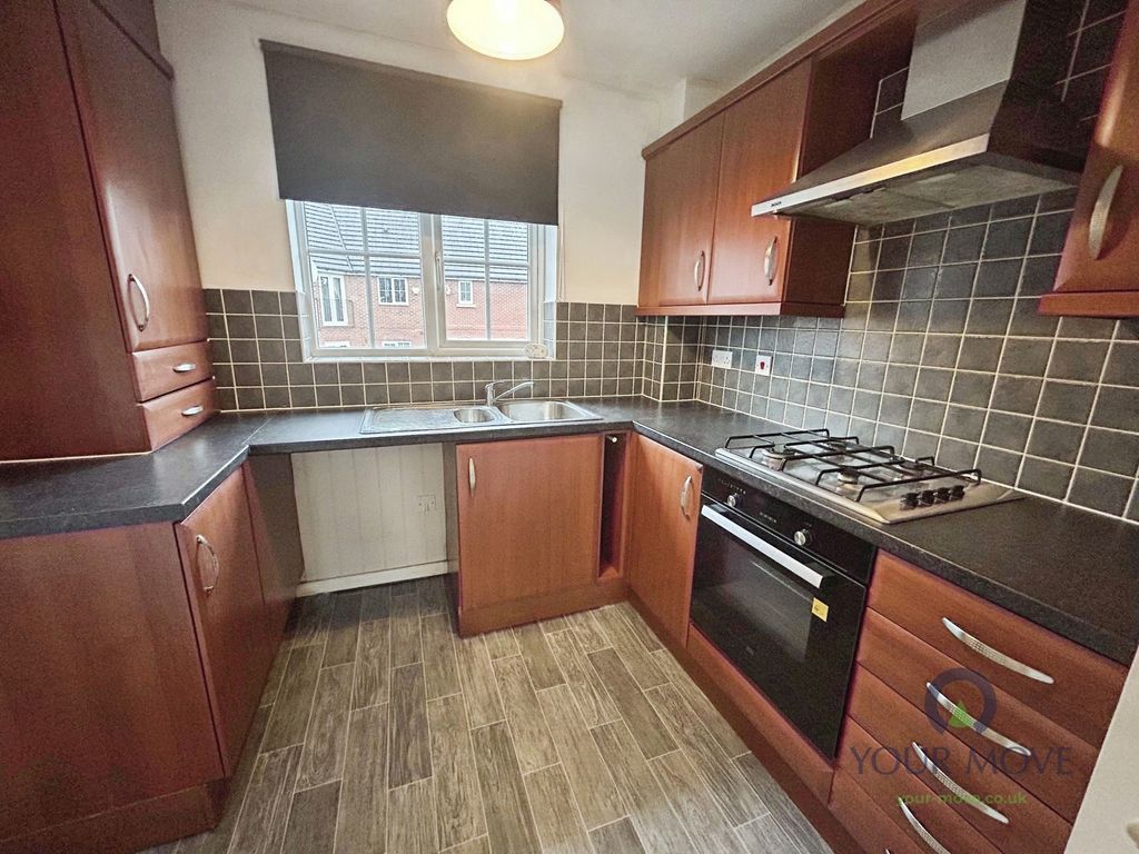 Property photo 3 of 6 Kitchen Area