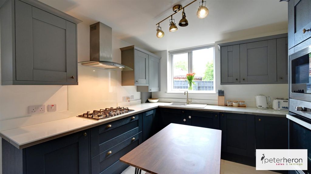 Property photo 3 of 13 Dining Kitchen